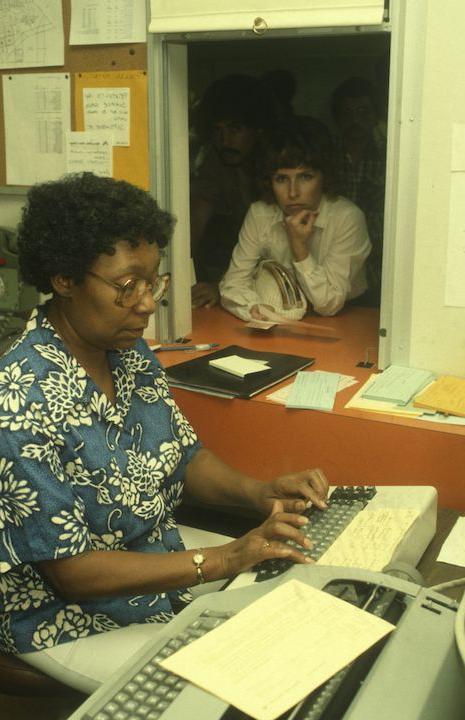 Woman at Information Help desk