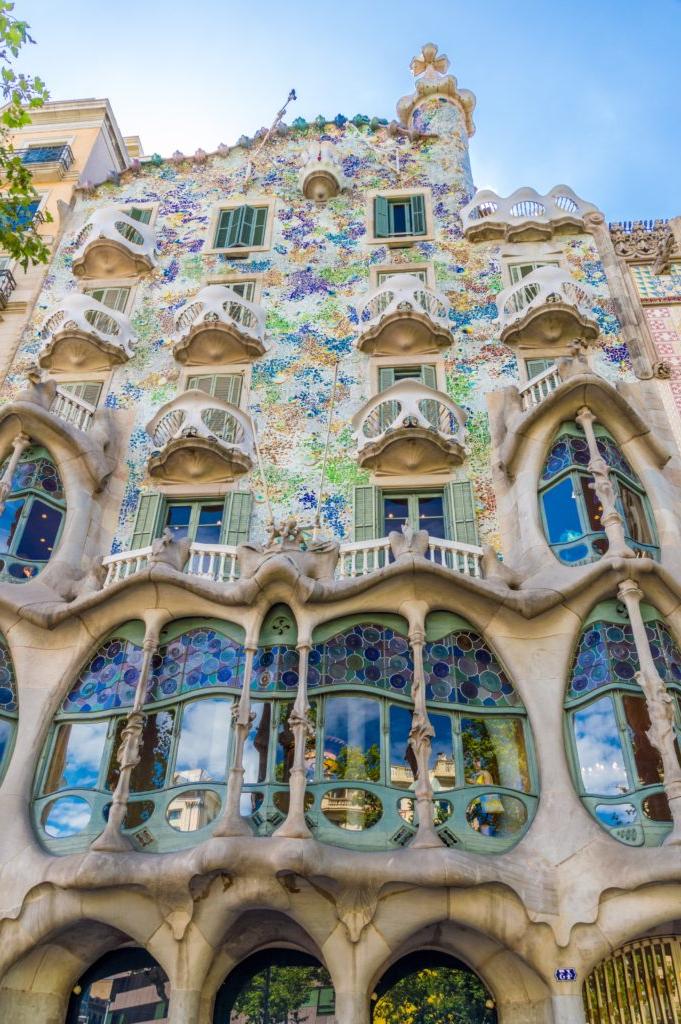 Building covered in artwork and intricate latices